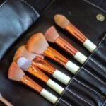 a close up of a set of makeup brushes